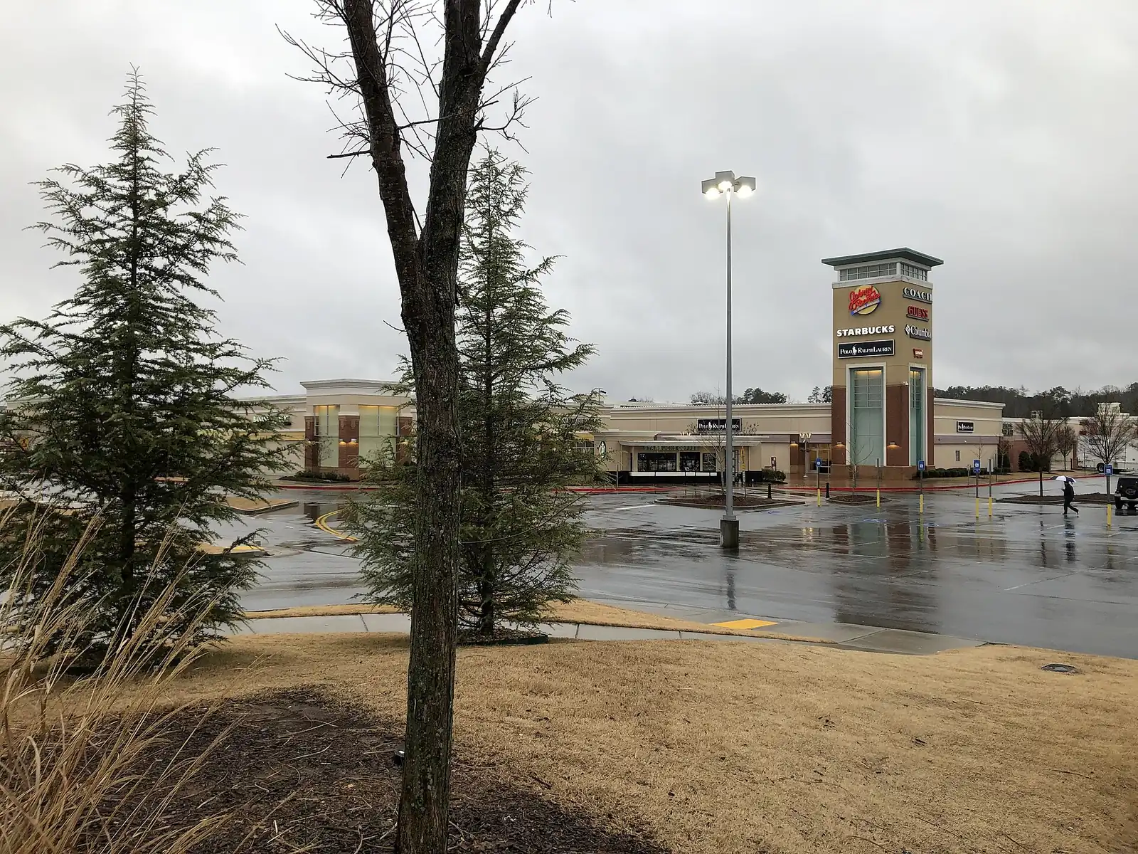 The entrance sign at the Outlet Shoppes at Atlanta on Ridgewalk Parkway in Woodstock