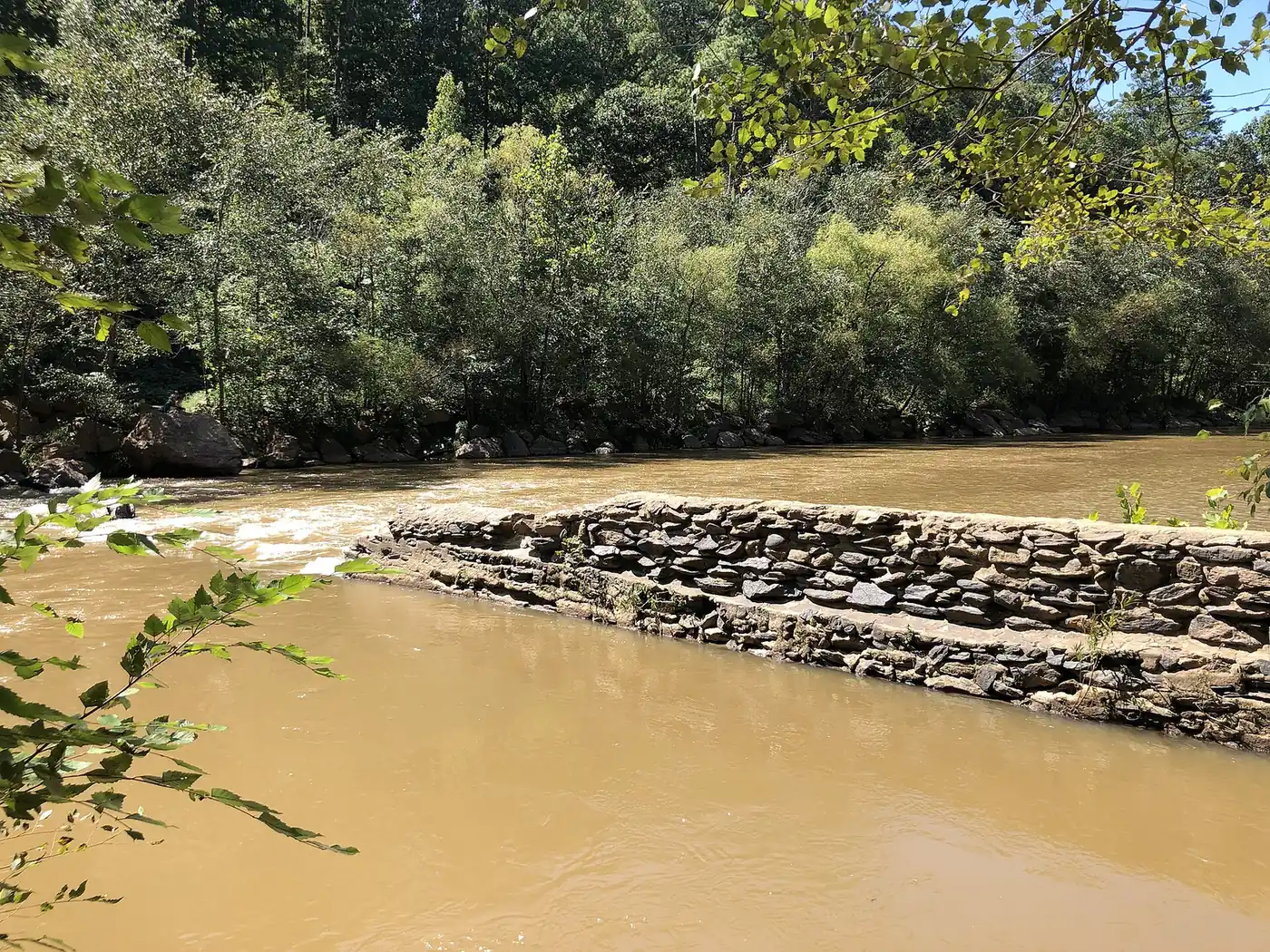 The stone ruins of the old rope mill on the Little River at Olde Rope Mill Park in Woodstock